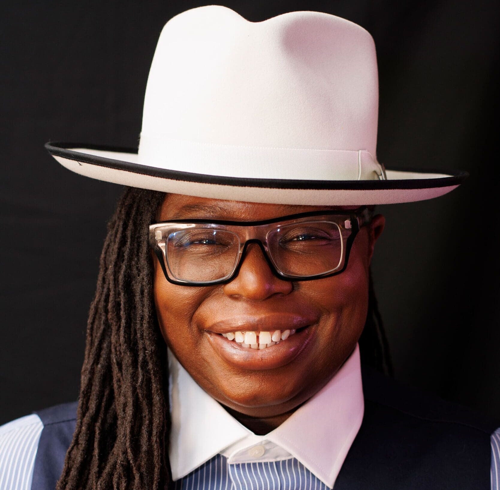 LaTashaforPAHeadshot_WhiteHatSmile